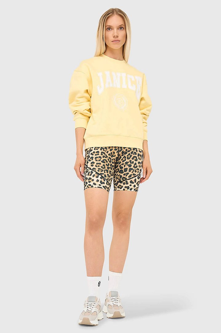 gele-dames-sweater-katoen-owen-logo-janice-02.webp